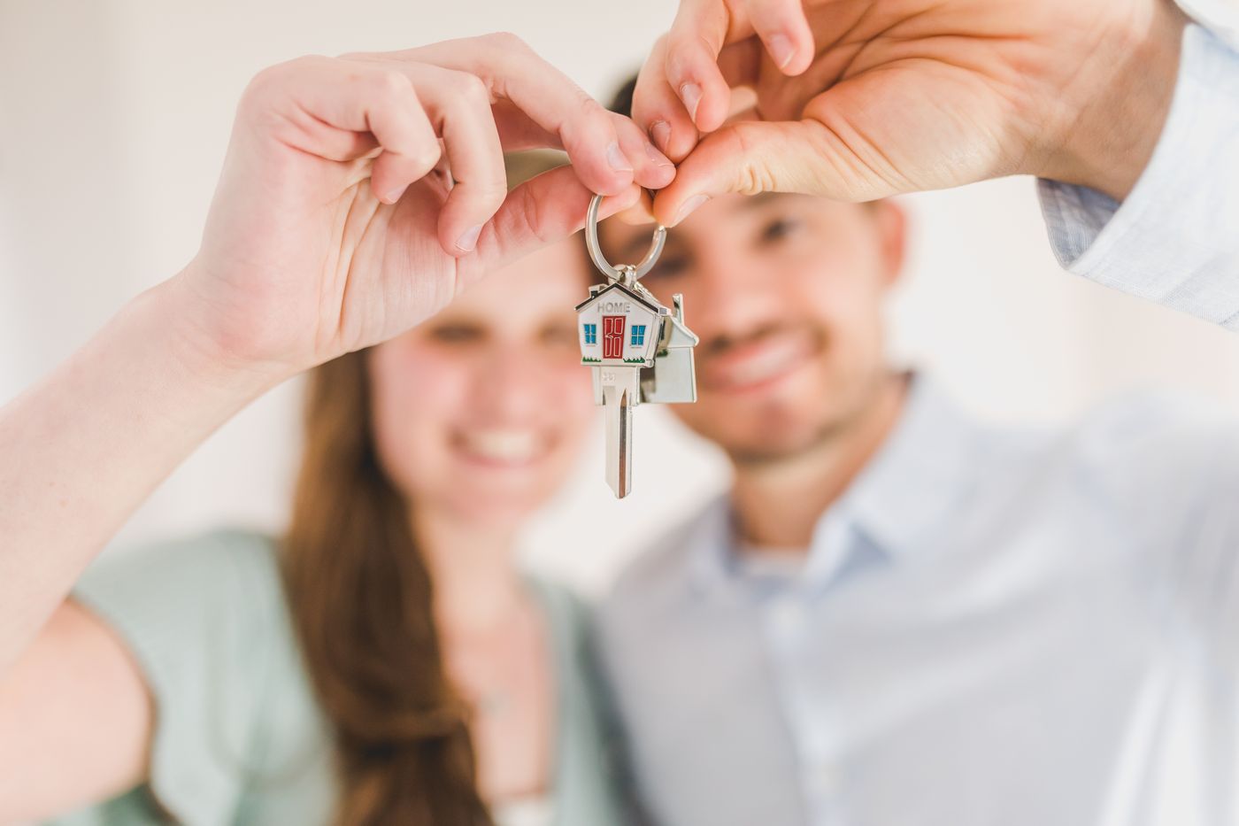 Family receiving keys to their new home